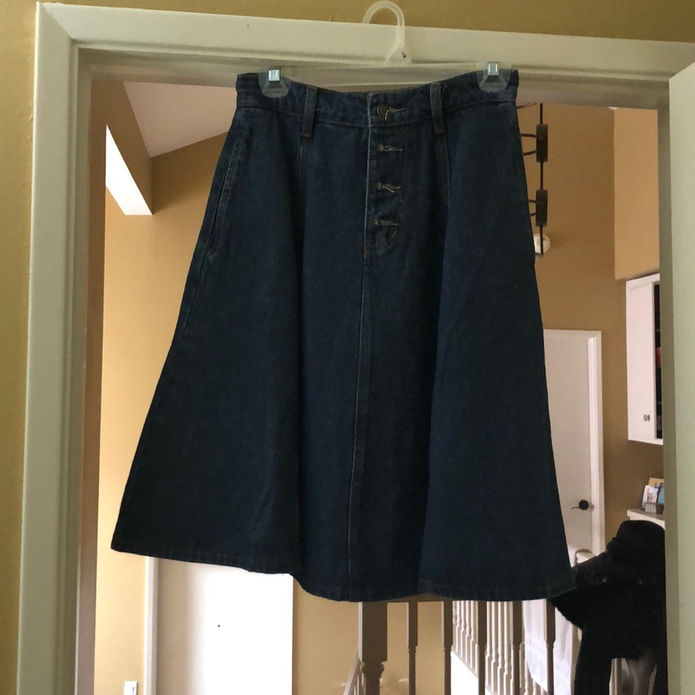 Knee-length denim skirt.